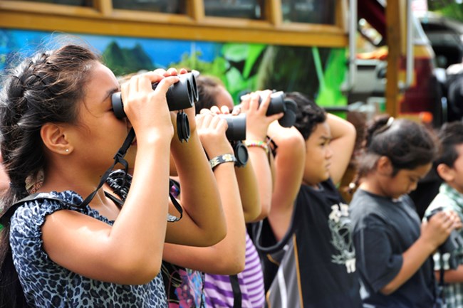 Alataua elementary students bird watching over at Lower Sauma Ridge Trail.