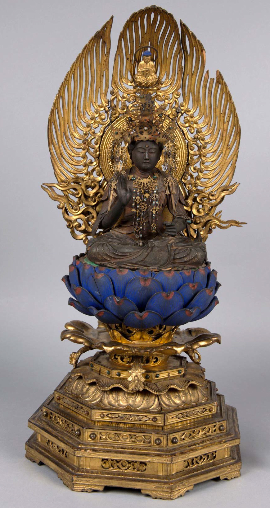 A 19th century Buddhist temple statuette from Japan.