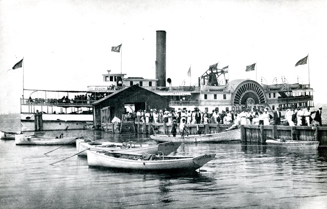 Passengers with waiting on dock steamboat