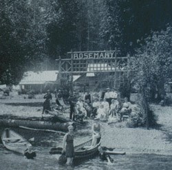 Historic photo of people posing in front of Rosemary cabin