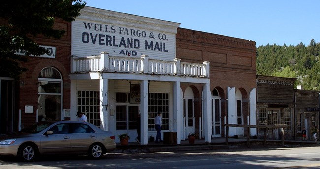 Streetscape in Virginia City (MT) showing Overland Mail office.