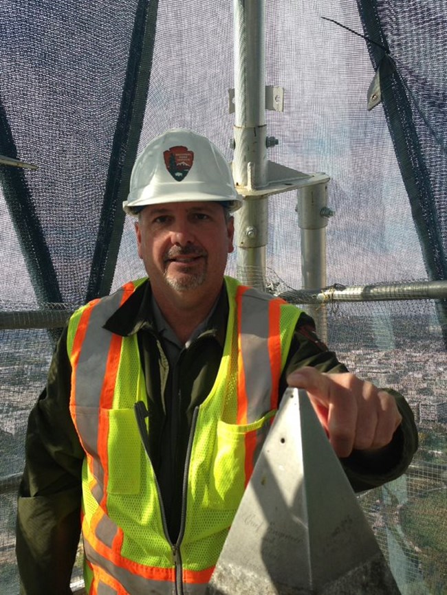 Engineer, Sean Kennealy, On top of  the Washington Monument.