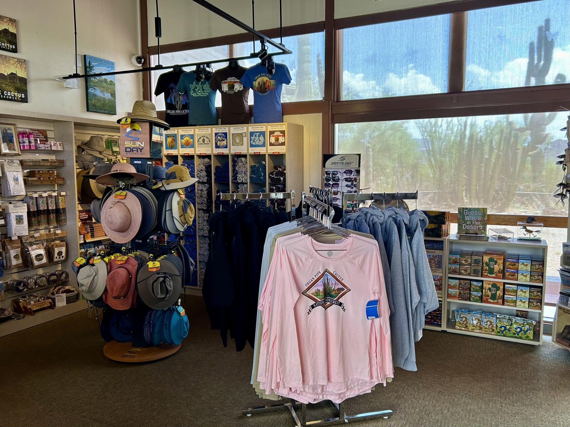 WNPA bookstore with shelves of books, shirts, mugs, and other mechandise