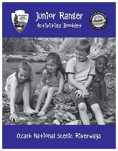 cover of junior ranger book with kids playing in creek