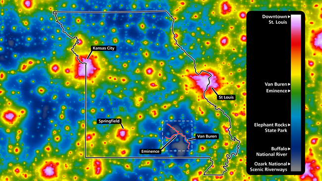 A map of the State of Missouri with a light pollution heatmap overlaid on it. Major urban areas like St. Louis and Kansas City are shown in bright pink and red, smaller towns are yellow and green, and rural areas are light to dark blue.