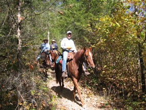 Riders on horseback on trails in the Ozark National Scenic Riverways