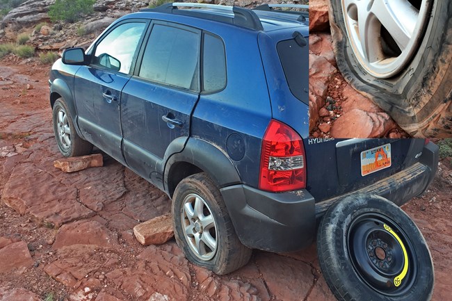 Car with flat tire in Hidden Canyon on rough 4x4 road