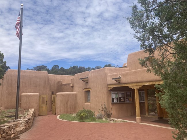 Adobe Building, Sky, Brick Walkway, Stone Walls, Flag Pole