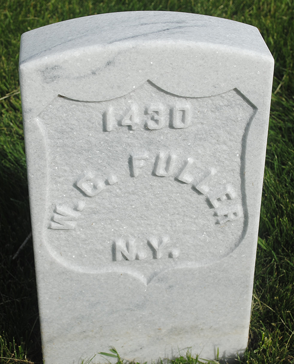Headstone text reads 1430 W. C. Fuller N.Y.