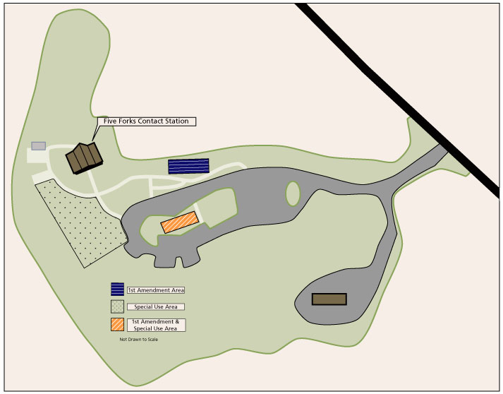 Map of Five Forks visitor center parking lot – blue and orange polygons north of and in the center of the parking area are for first amendment uses. The orange polygon in the center of the parking lot and the polygon filled with dots are for special park