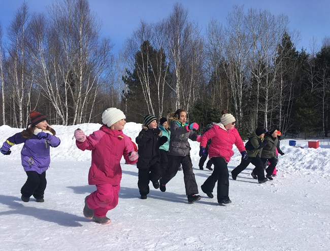 4th graders playing a winter game during a field trip