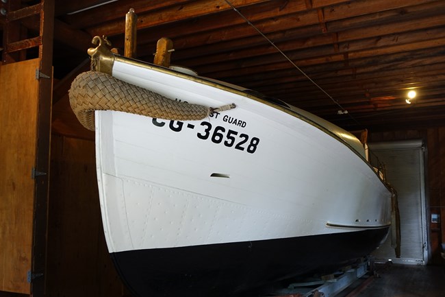 Authentic lifeboat in the boathouse on Sand Point