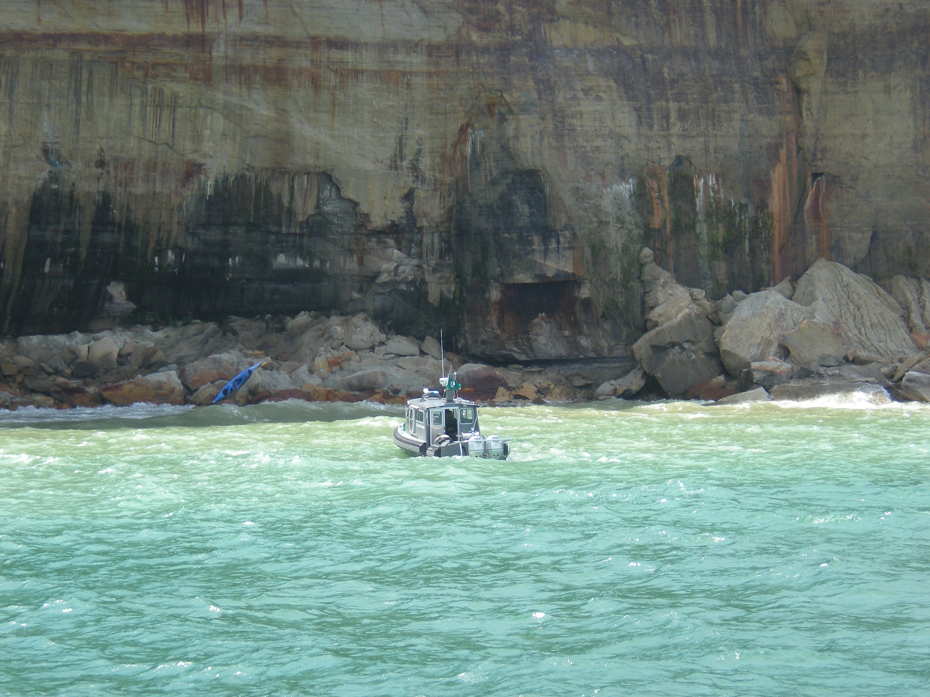 Kayak rescue along Pictured Rocks cliffs