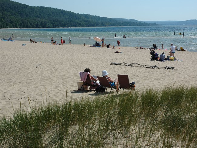 Swimming and sunbathing at Sand Point