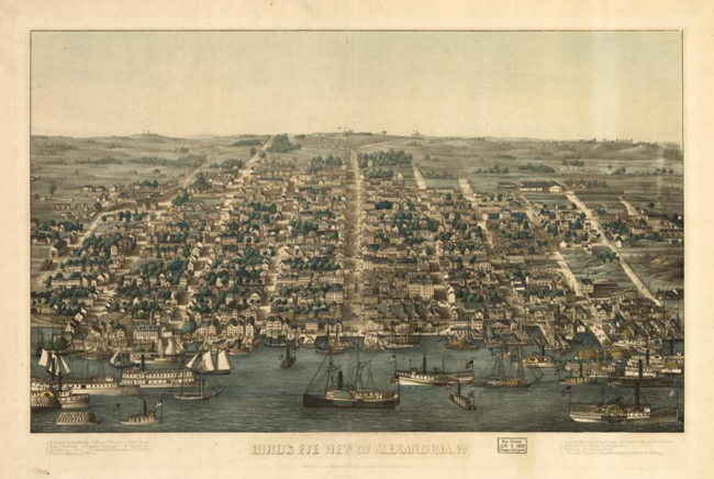 Cityscape packed with buildings in front of a port full of boats