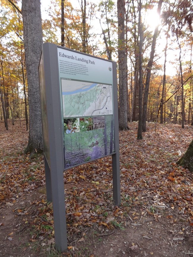 An upright panel showing information about the Potomac Heritage Trail