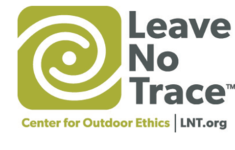 The Leave No Trace logo. A green square with rounded corners containing a spiral pattern.