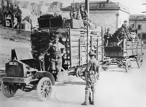 Quartermaster soldiers distributing relief supplies