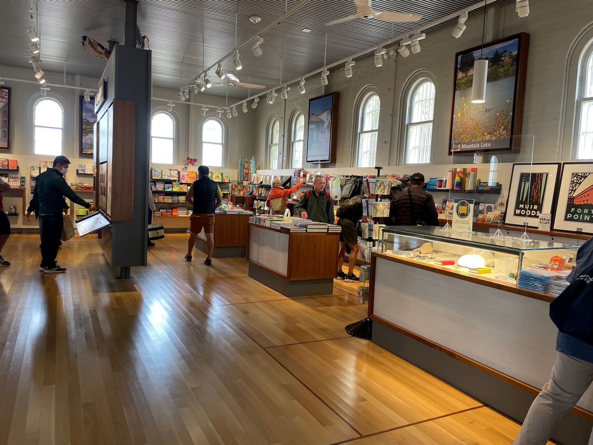 Interior of the presidio park store with tables of books, shirts and other merchandise
