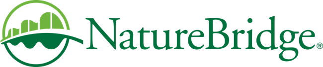 Green logo of a leaf in a circle to the left of the word NatureBridge