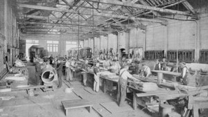 Workers in a Tin Shop Warehouse