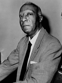Black and White Photo of A. Philip Randolph wearing a suit and tie.