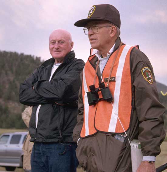 a photo of a volunteer teaching a visitor