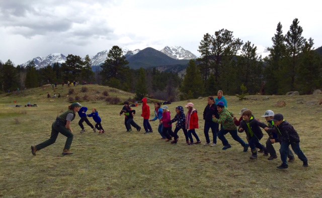 Students play an educational game on a field trip to Rocky Mountain National Park.