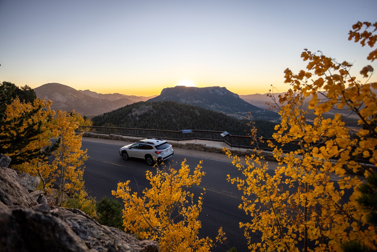 Fall scene of car on Trail Ridge Road