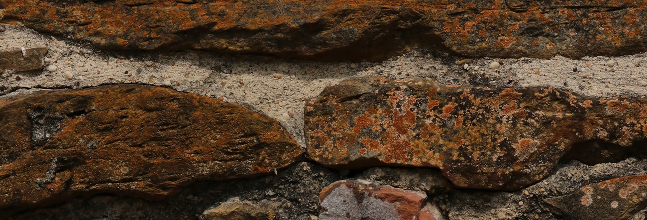Closeup of limestone wall at Mission San Juan
