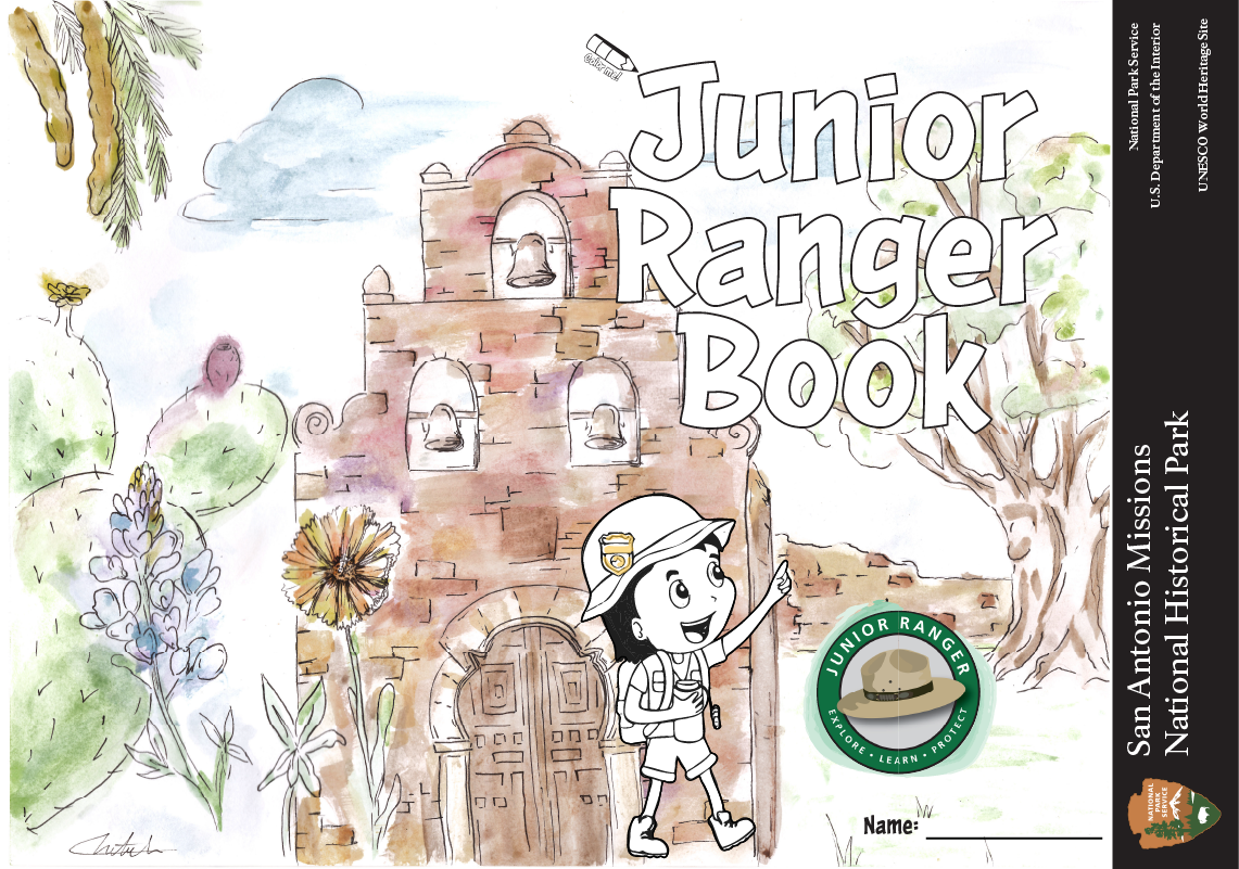 Junior Ranger booklet being held up in front of the church at Mission San Jose