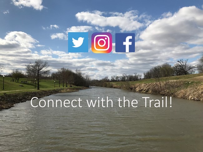 A wide river with flat, vegetated banks, and the logos of facebook, twitter and instagram.