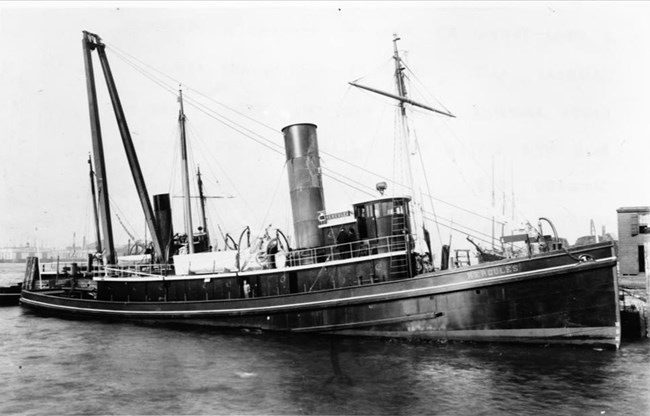 Black and white image of tugboat Hercules