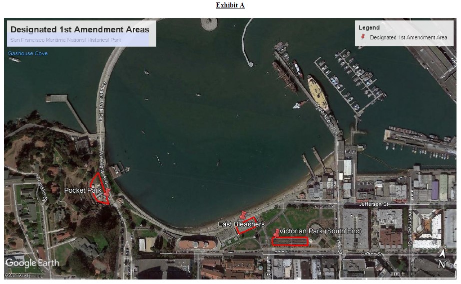 [map] High aerial shot of Aquatic Park, highlighting (in red outline) the “designated first amendment areas” in an 800 foot radius – left to right this is Pocket Park, East Bleachers, Victorian Park (South End).