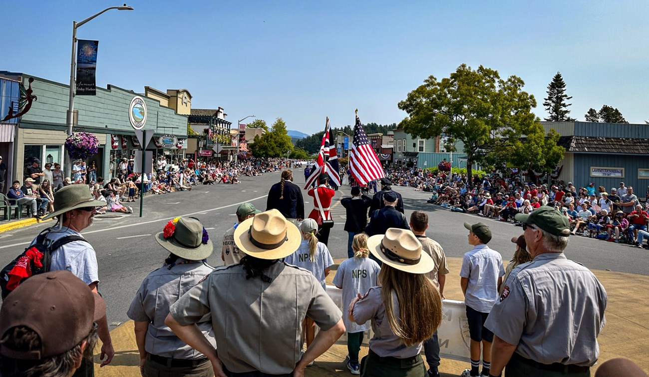 Park Staff and Volunteers walking in the Friday Harbor 4th of July parade 2023.