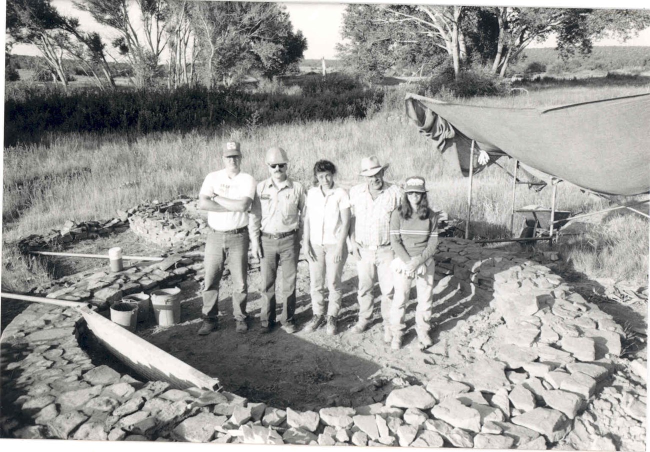 An early crew standing within the torreon prior to stabilization.