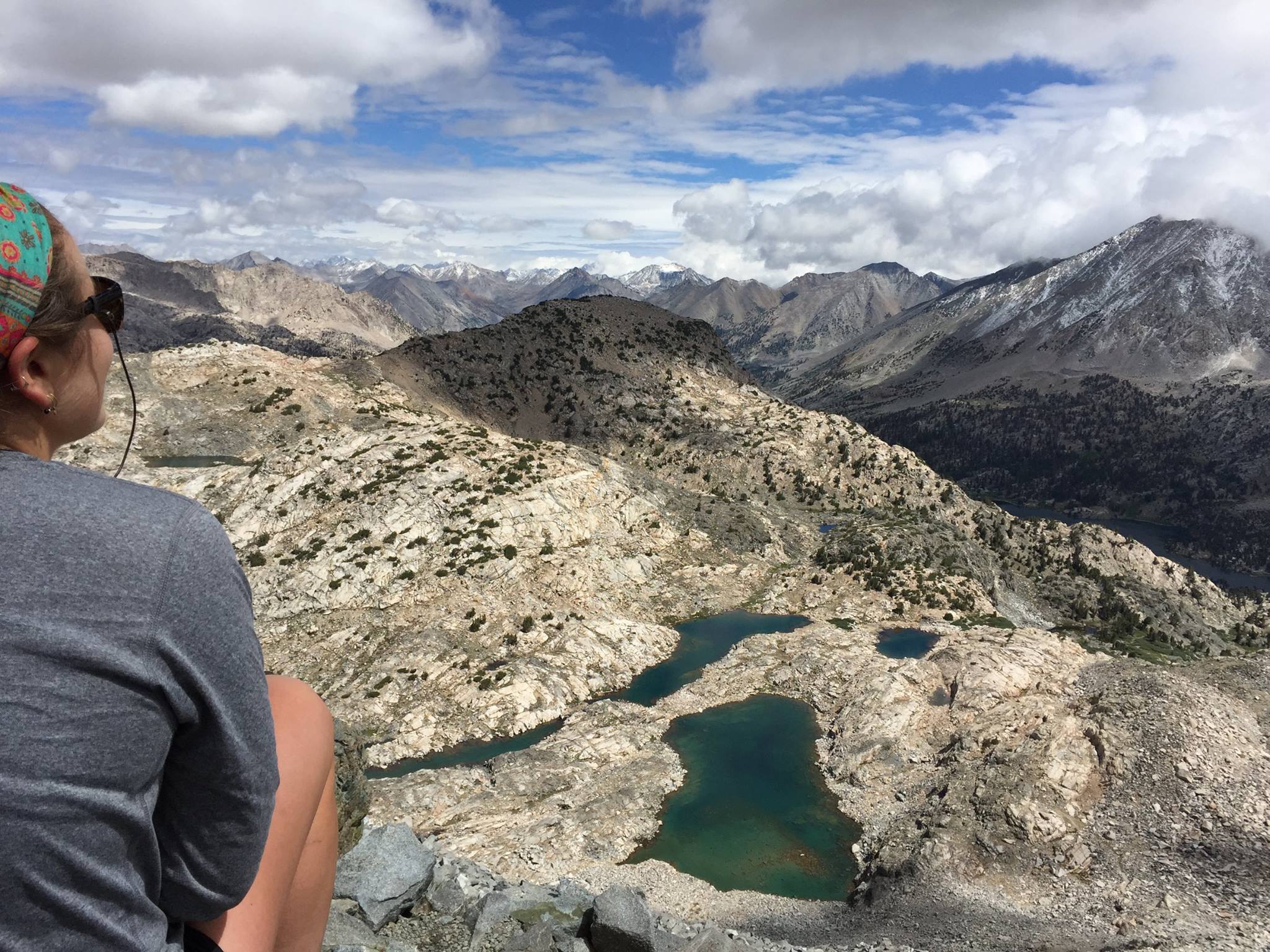 Person looking out from the top of Glen Pass