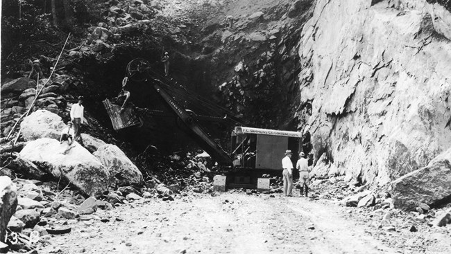 Black and white photo of the construction of Marys Rock Tunnel by the Civilian Conservation Corps.