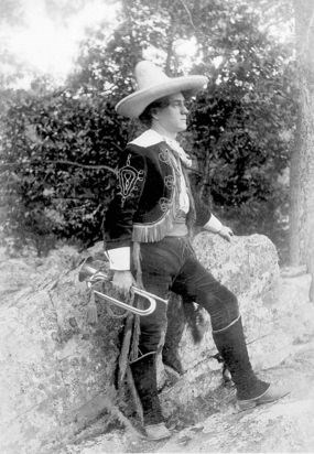 George F. Pollock in costume with bugle at Skyland.