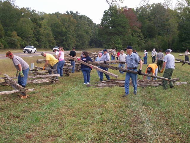 Volunteers erecting a fence during NPLD 2012