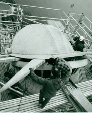 A worker repairing the Statue's crown, December 10, 1985.