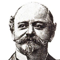 Illustration of a bald man with a moustache and soul patch.