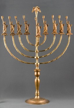 Menorah with nine candle holding statuettes of the Statue of Liberty, circa 1986.