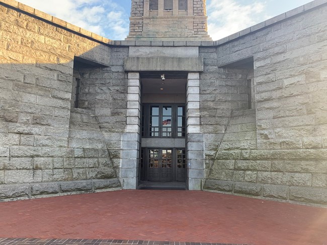 The entrance to the monument is through large doors which enter into Fort Wood.