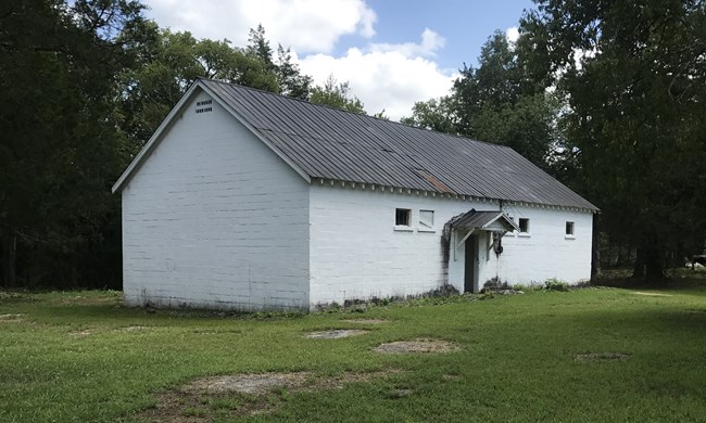 A rectangular white building.