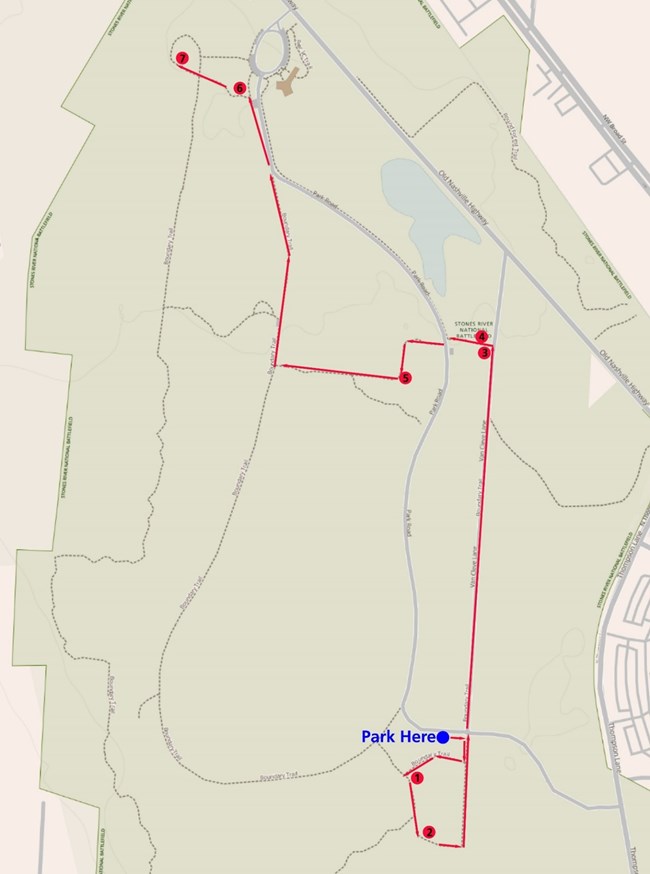 Map of park roads and trails showing a route marked in red with numbered sites.
