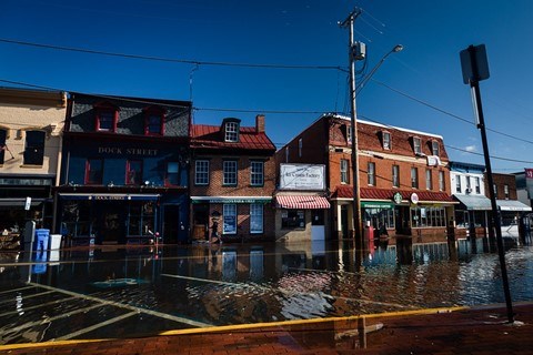 A street in downtown Annapolis floods after a storm