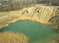 gravel pit with water covering the bottom