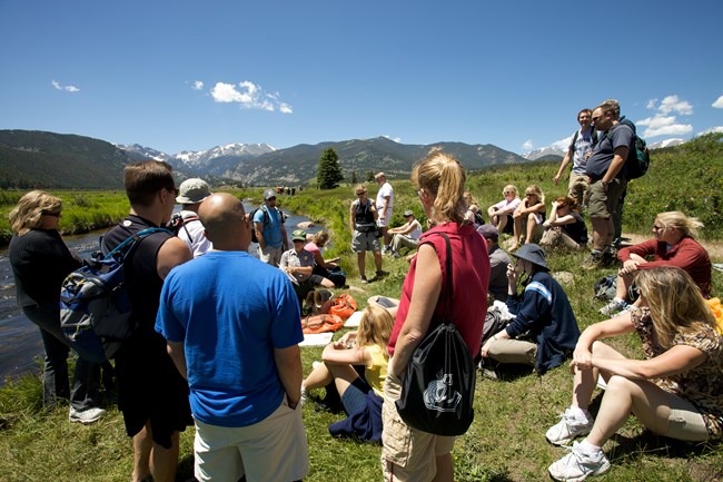 Photograph of students listening to a NPS air resources division presenter during a field trip to Rocky Mountain NP, Colorado.