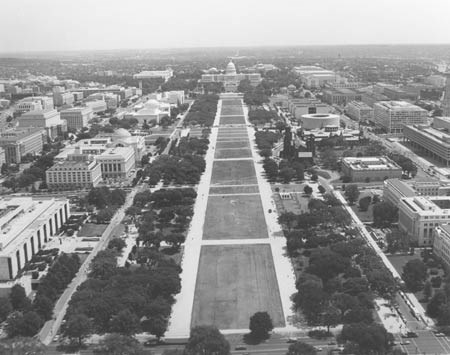 An aerial view of the mall towards the Capitol show the layout of turf and trees
